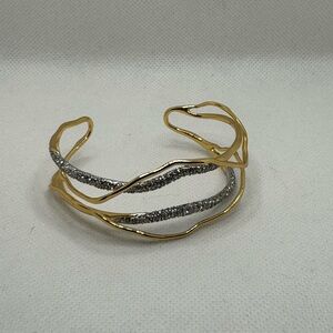 Elegant Gold and Silver Wave Bracelet